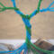 mermaid blue and light green wire twisted into tree trunk colors blend together to create an enchanted look